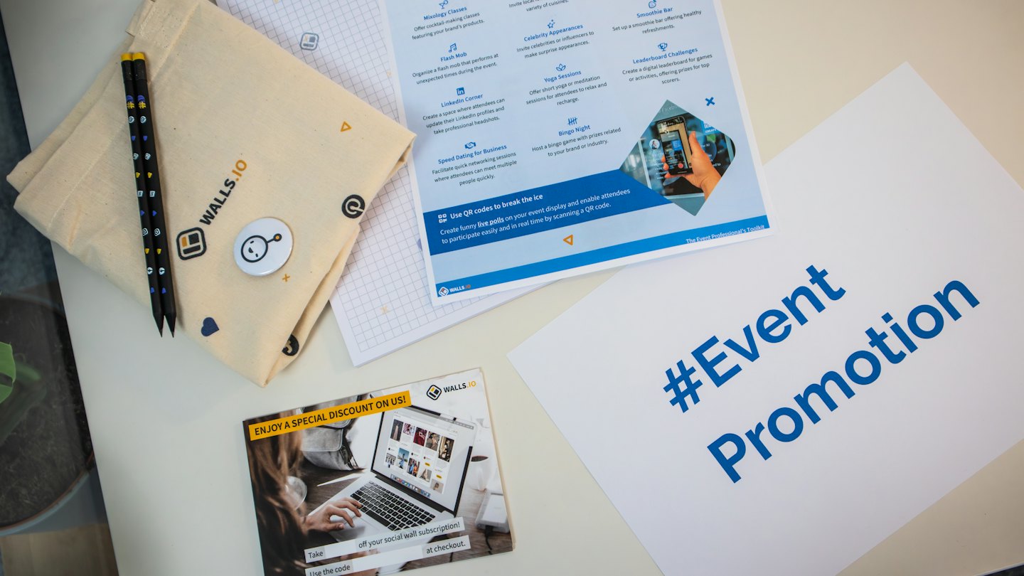 Walls.io promotional materials laid out on a light surface.